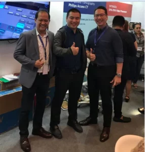 Akicare representative with medical imaging partners at an ultrasound exhibition