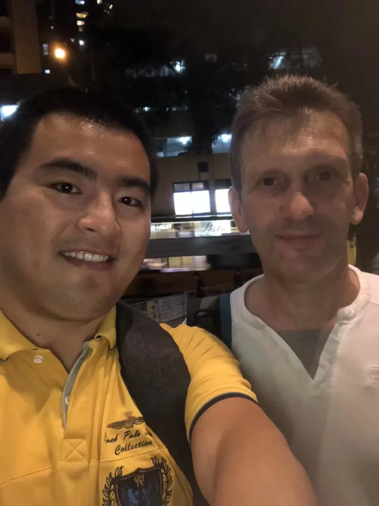 Akicare representative with a business contact during an in-person meeting