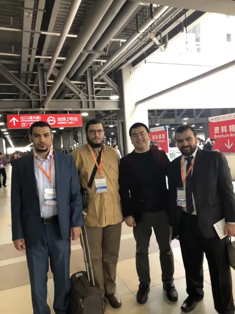 Akicare representative with business contacts at a medical imaging exhibition