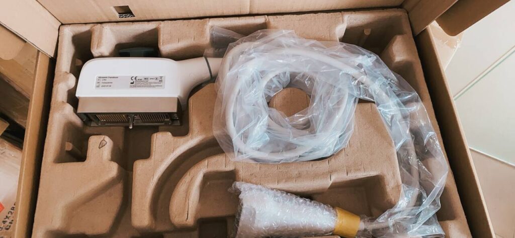 Packaged linear ultrasound probe with cable and connector